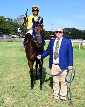 Royal Legacy (Akshay Kumar up) winner of the ZAVARAY S POONAWALLA MYSORE 1000 GUINEAS 2026 (GR.3), being led in by trainer J E Mckeown on Friday races at Mysore.
